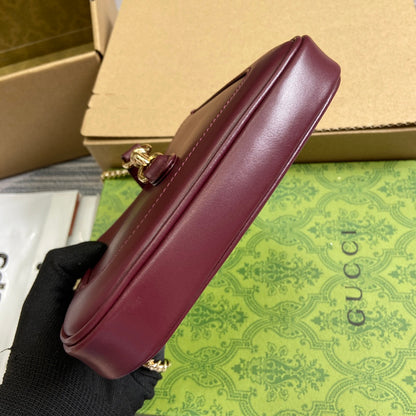 MINI SAC JACKIE NOTTE 19 EN CUIR DE VEAU ROUGE BORDEAUX, QUINCAILLERIE DORÉ