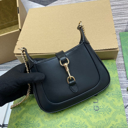 MINI SAC JACKIE NOTTE 19 EN CUIR DE VEAU NOIR ET QUINCAILLERIE DORÉ