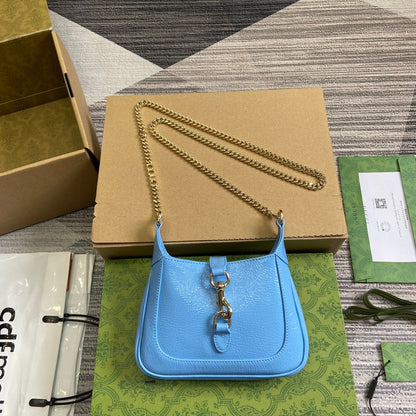 MINI SAC JACKIE NOTTE 19 EN CUIR DE VEAU LAQUÉ CRAQUELÉ BLEU OCÉAN, QUINCAILLERIE DORÉ