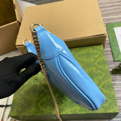 MINI SAC JACKIE NOTTE 19 EN CUIR DE VEAU LAQUÉ CRAQUELÉ BLEU OCÉAN, QUINCAILLERIE DORÉ