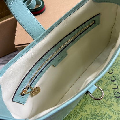 Petit sac bandoulière Jackie 27 en cuir de veau laqué craquelé vert menthe, accessoires dorés 