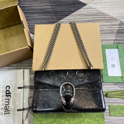 Petit sac bandoulière Dyonysus 28 en cuir de veau embossé laqué noir, accessoires argentés
