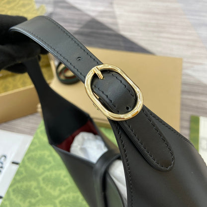 Sac bandoulière Jackie Medium 35 en cuir de veau noir et métal doré 
