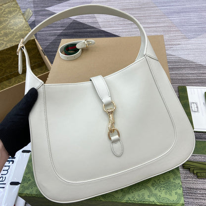 Sac bandoulière Jackie Medium 35 en cuir de veau blanc et métal doré 