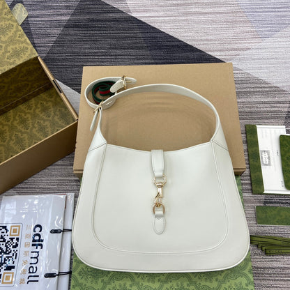 Sac bandoulière Jackie Medium 35 en cuir de veau blanc et métal doré 