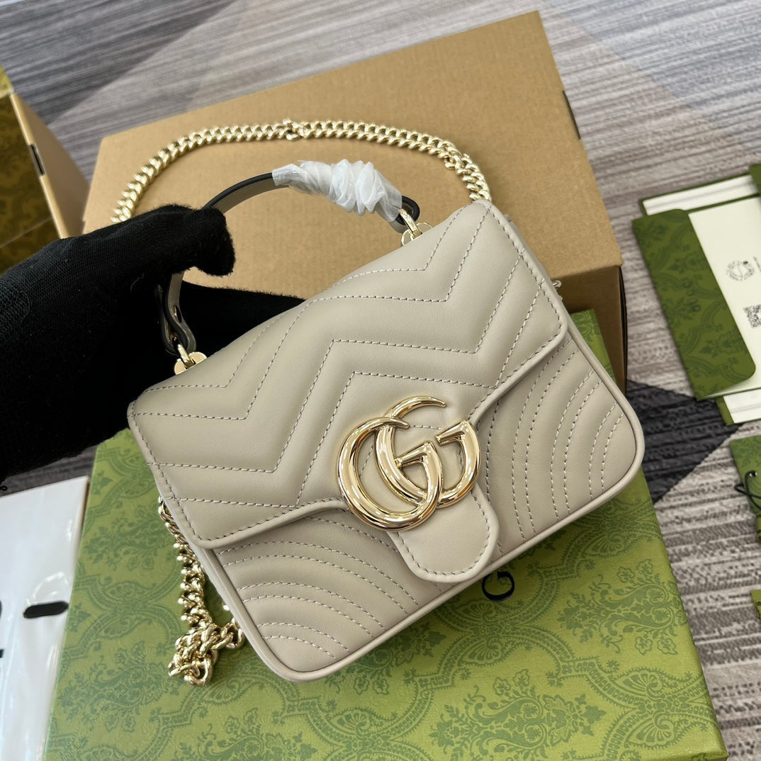 Mini sac à main GG Marmont 13 en cuir de veau blanc
