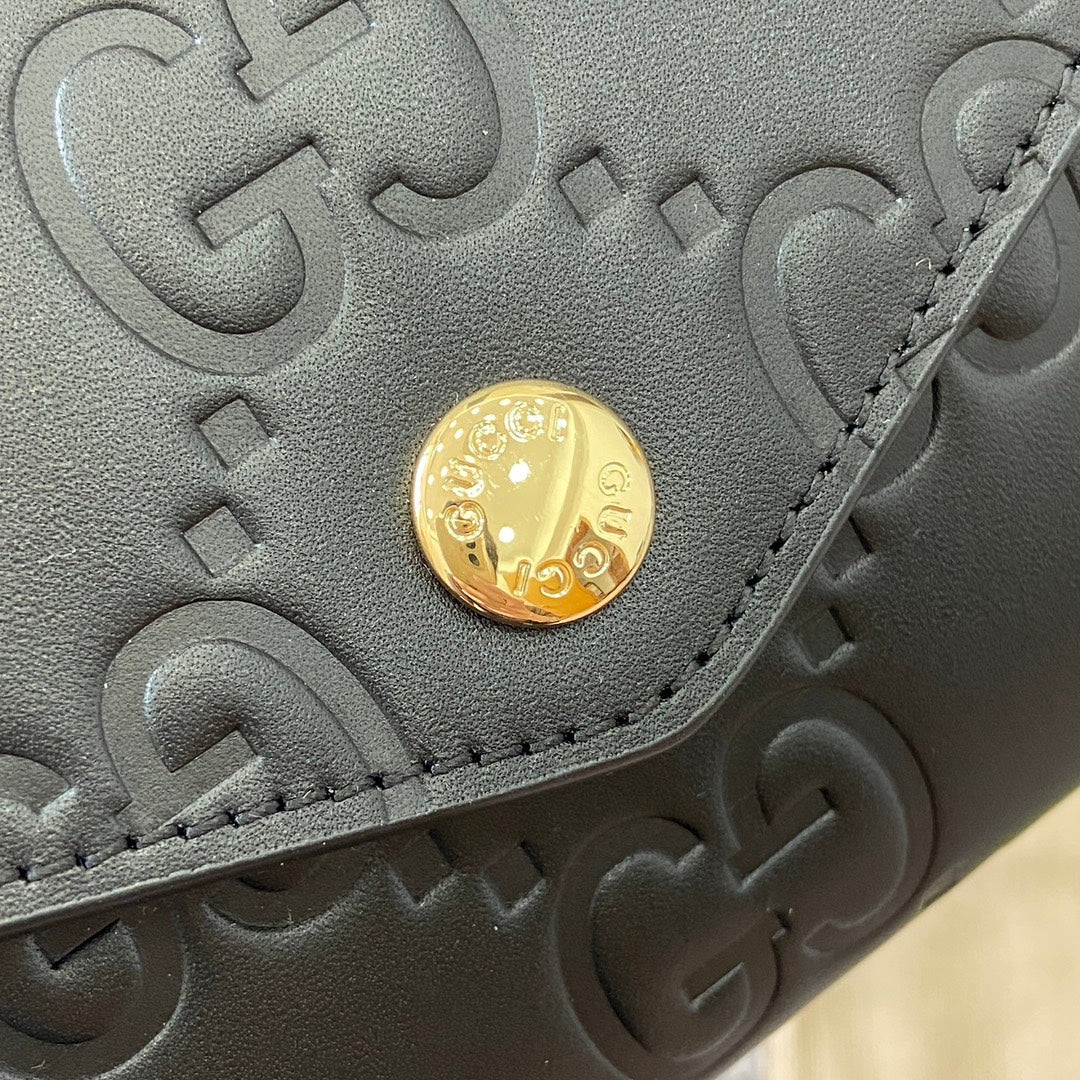Portefeuille continental 19 en cuir de veau embossé noir, matériel doré