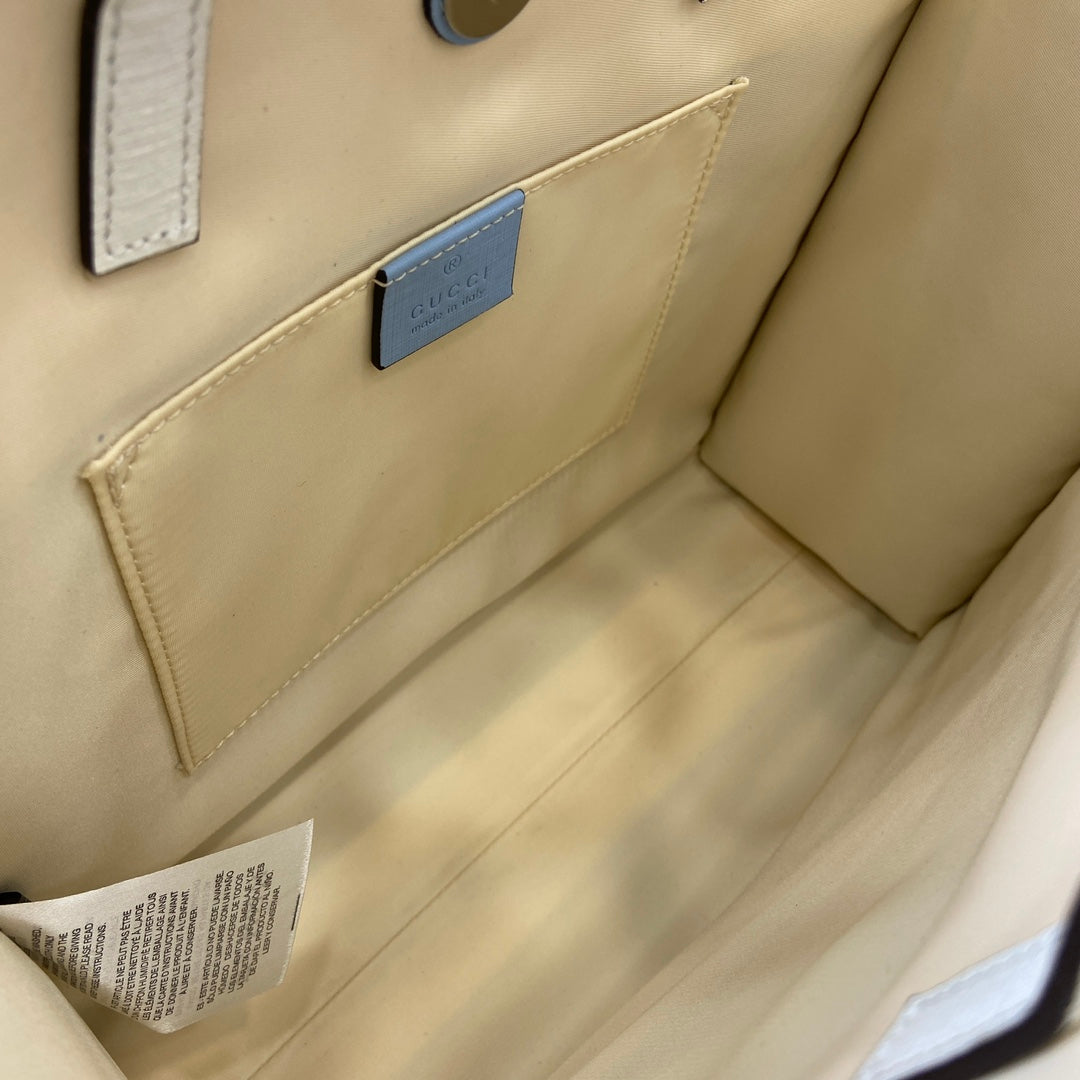 SAC CABAS ENFANT IMPRIMÉ CHIOT 28 EN TOILE BEIGE ET BORDURE EN CUIR DE VEAU BLANC