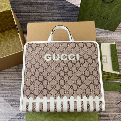 SAC CABAS 28 IMPRIMÉ ANIMALIER EN TOILE BEIGE ET BORDURE EN CUIR DE VEAU BLANC