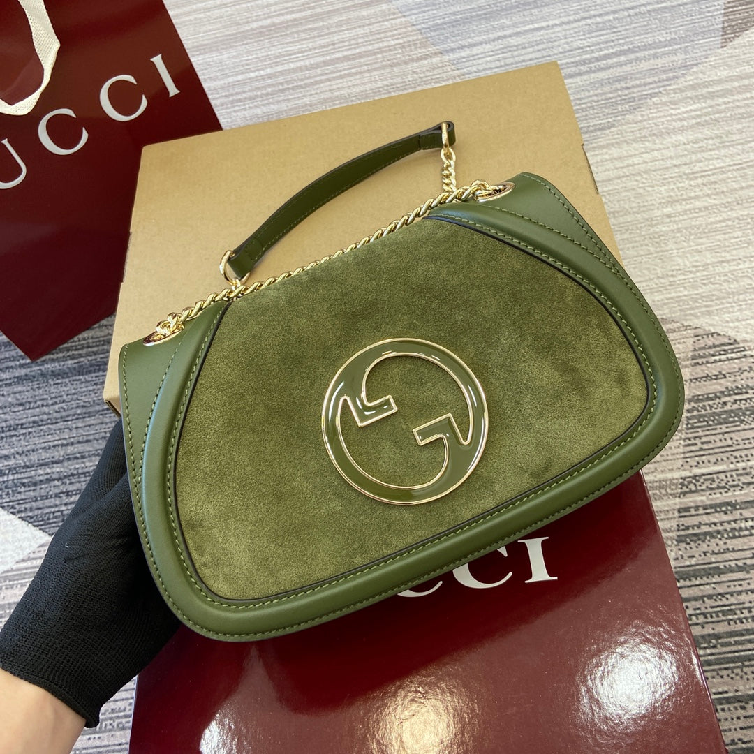 Petit sac bandoulière Blondie 26 en cuir de veau vert genévrier et daim, finitions dorées