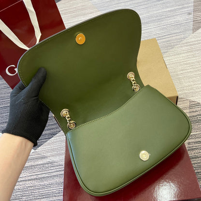 Petit sac bandoulière Blondie 26 en cuir de veau vert genévrier et daim, finitions dorées