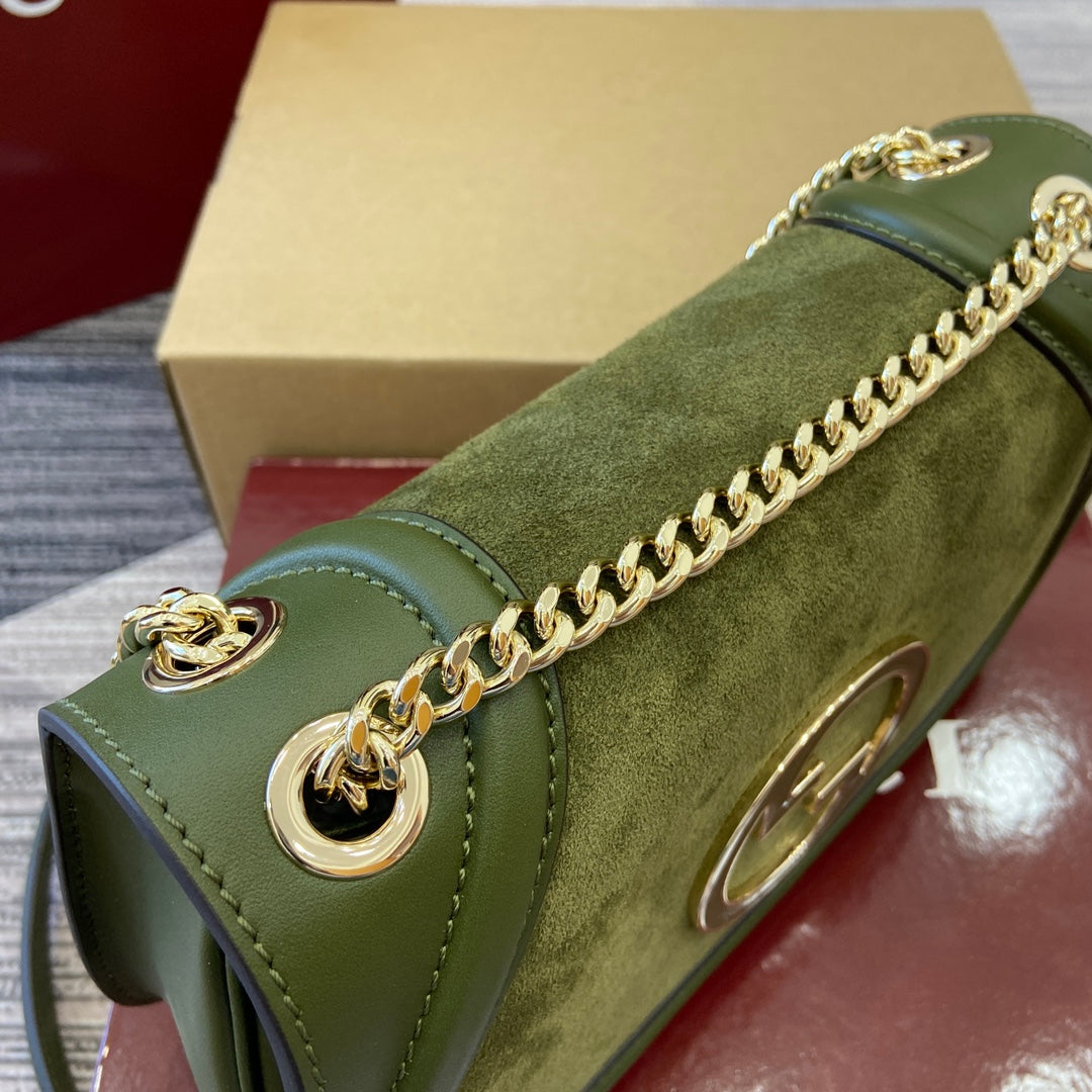 Petit sac bandoulière Blondie 26 en cuir de veau vert genévrier et daim, finitions dorées