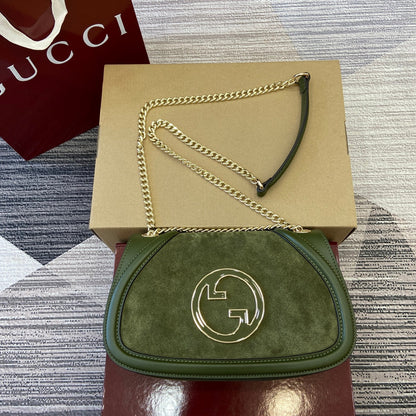 Petit sac bandoulière Blondie 26 en cuir de veau vert genévrier et daim, finitions dorées