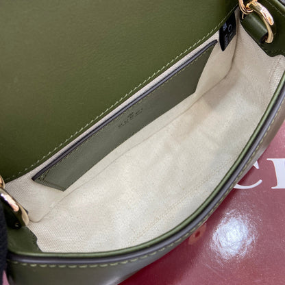 Mini sac bandoulière Blondie 21 en cuir de veau vert genévrier et daim, finitions dorées