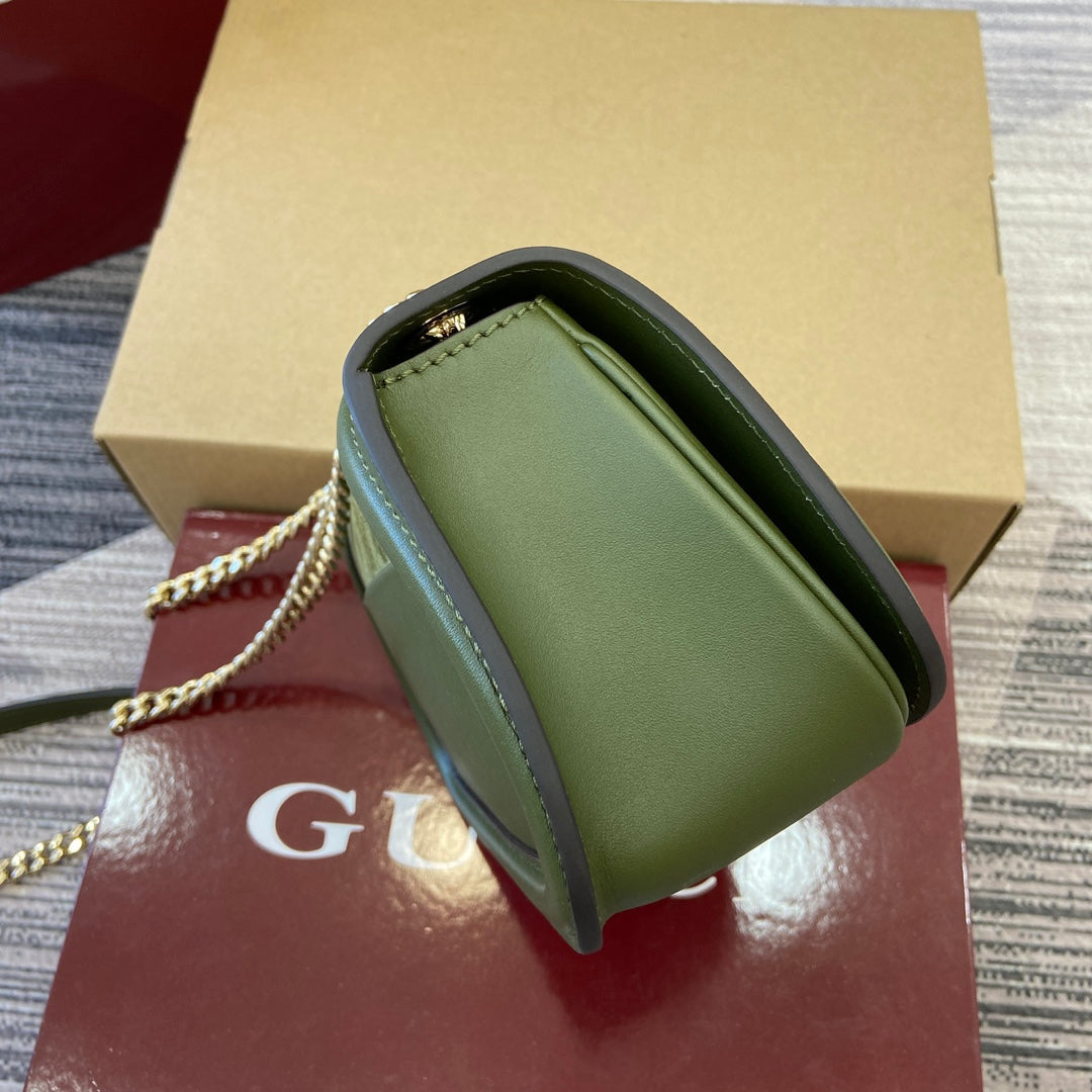 Mini sac bandoulière Blondie 21 en cuir de veau vert genévrier et daim, finitions dorées