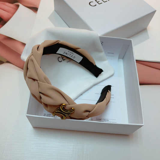 BANDEAU EN TISSU BEIGE CAMEL AVEC LOGO DORÉ 124700
