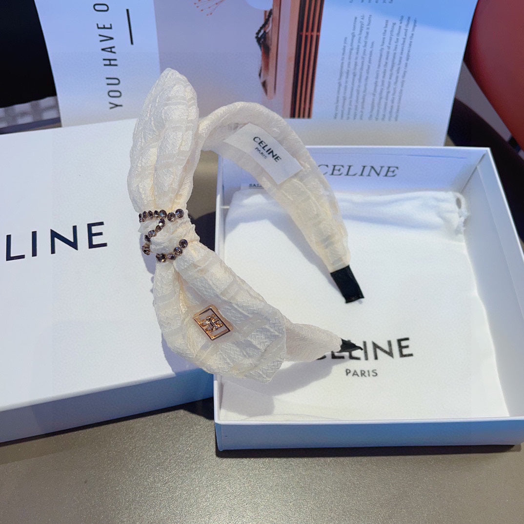 TISSU VOILE BLANC CRÈME AVEC LOGO DORÉ 391641