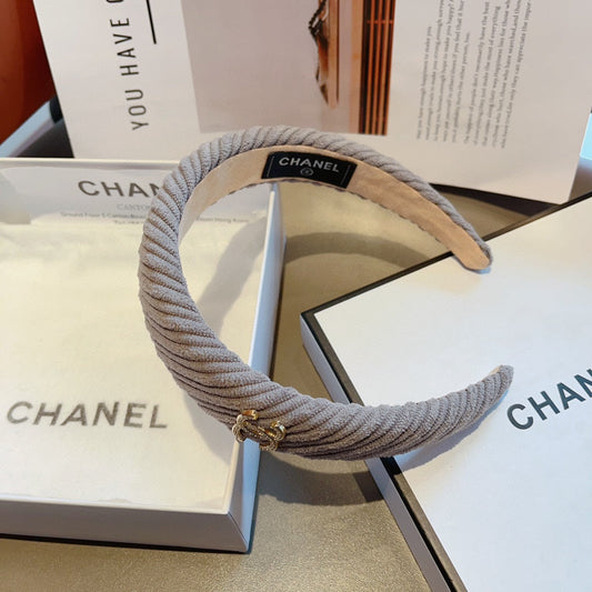BANDEAU EN TISSU MARRON KAKI AVEC LOGO DORÉ 414435