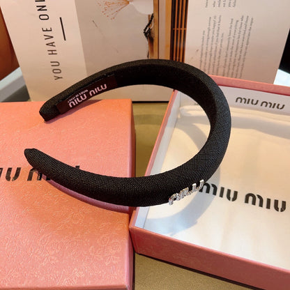 Bandeau épais en tissu brut noir 423578