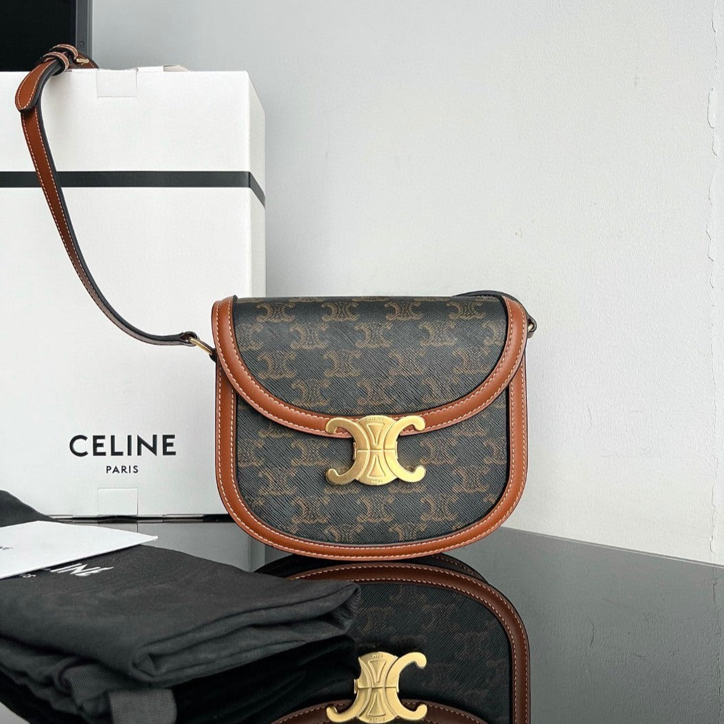 Sac à main TRIOMPHE 15 en cuir de veau noir à motifs