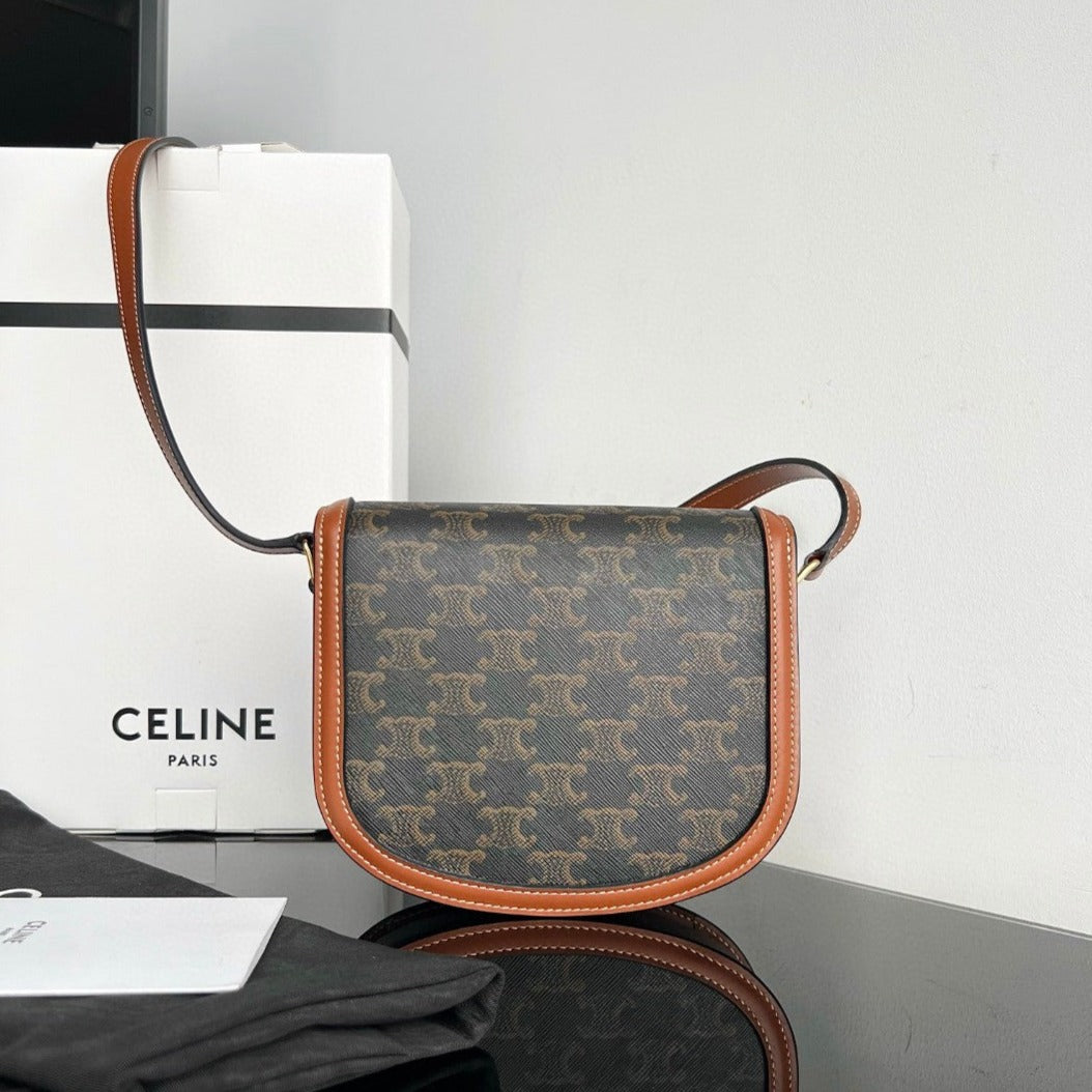 Sac à main TRIOMPHE 15 en cuir de veau noir à motifs
