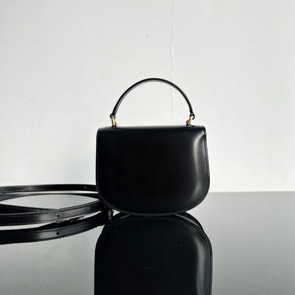 Sac à main TRIOMPHE 15 en cuir de veau noir