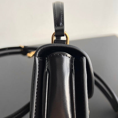 Sac à main TRIOMPHE 15 en cuir de veau noir