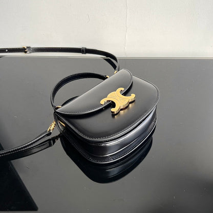Sac à main TRIOMPHE 15 en cuir de veau noir