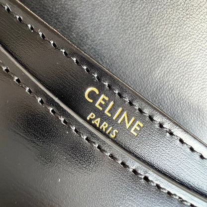 Sac à main TRIOMPHE 15 en cuir de veau noir