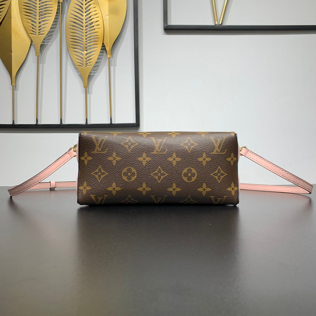 Pochette Bloom 22 en toile monogrammée marron et côtés en cuir de veau rose pastel