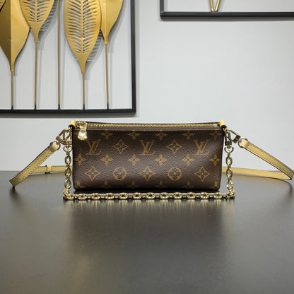POCHETTE BLOOM 22 EN TOILE MONOGRAMME MARRON ET CÔTÉS EN CUIR DE VEAU JAUNE PASTEL