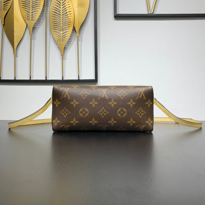 POCHETTE BLOOM 22 EN TOILE MONOGRAMME MARRON ET CÔTÉS EN CUIR DE VEAU JAUNE PASTEL