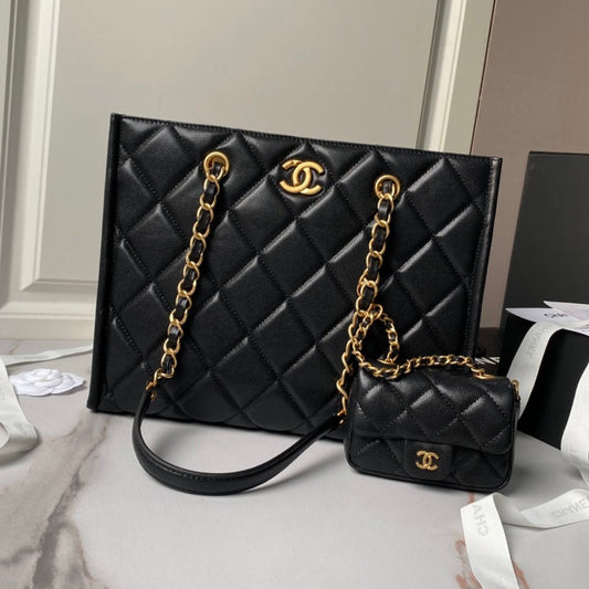 Sac shopping 24a 30 cm noir caviar matériel doré