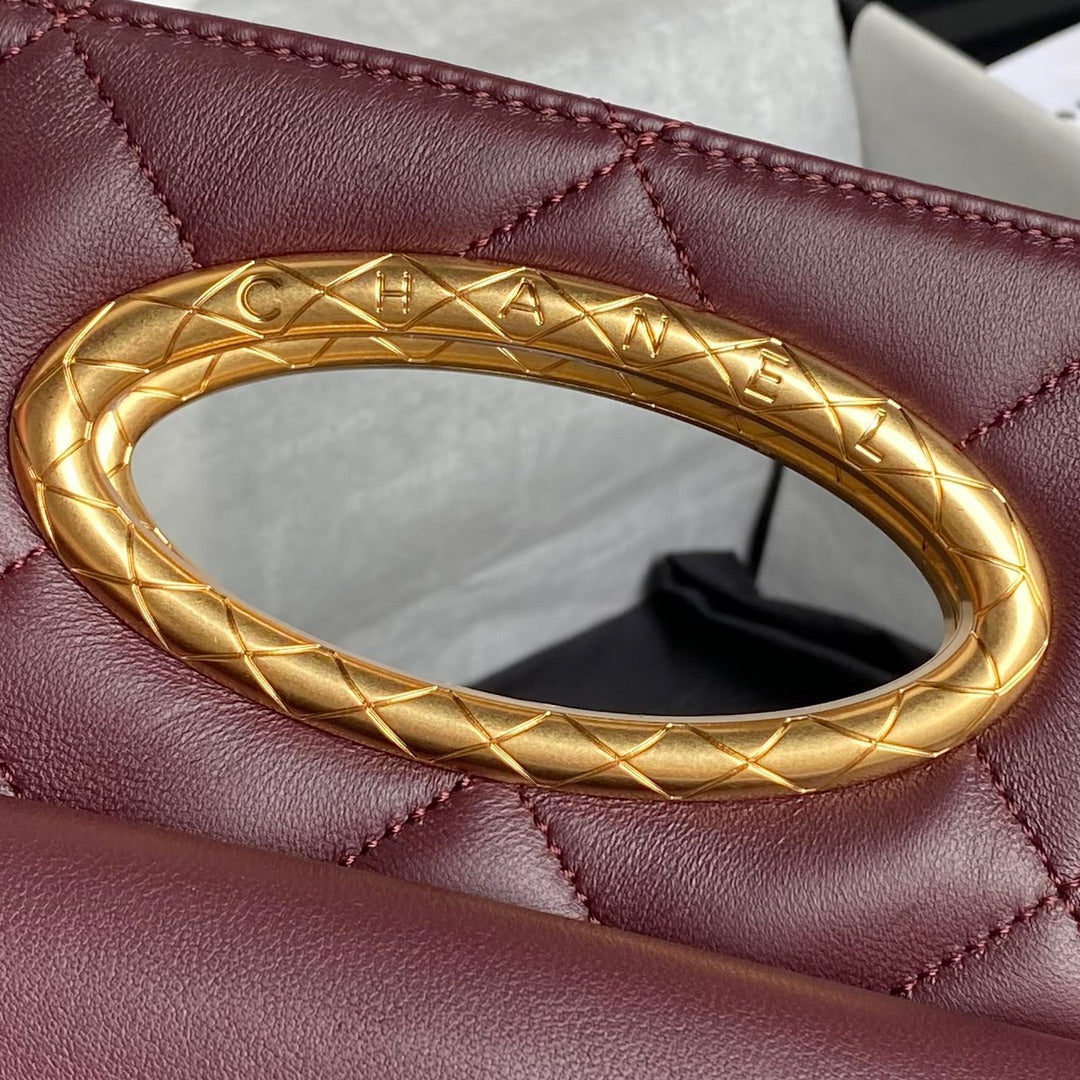 Pochette CC 24b 25 cm en cuir d'agneau bordeaux