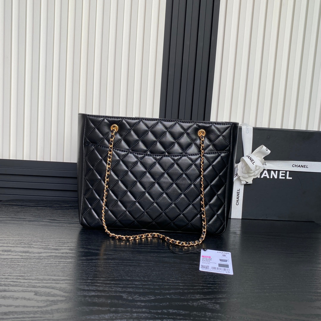 Sac cabas 24 carats 32 cm en cuir de veau noir, finitions dorées