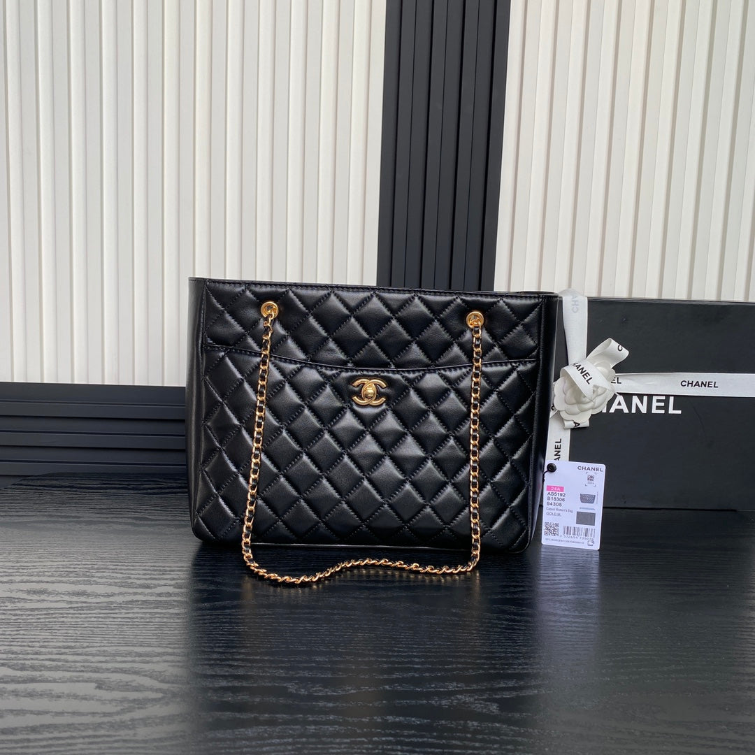 Sac cabas 24 carats 32 cm en cuir de veau noir, finitions dorées