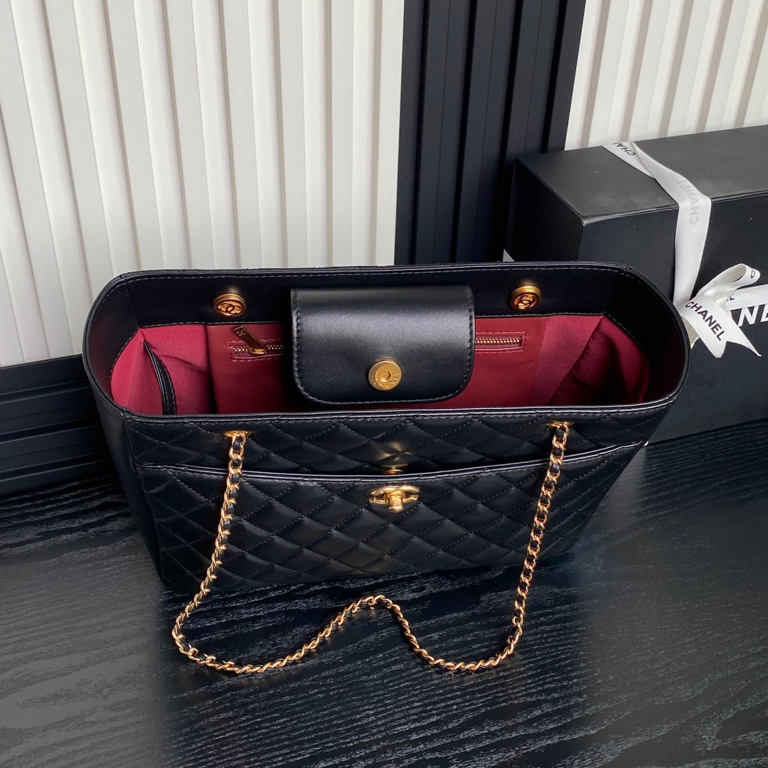 Sac cabas 24 carats 32 cm en cuir de veau noir, finitions dorées