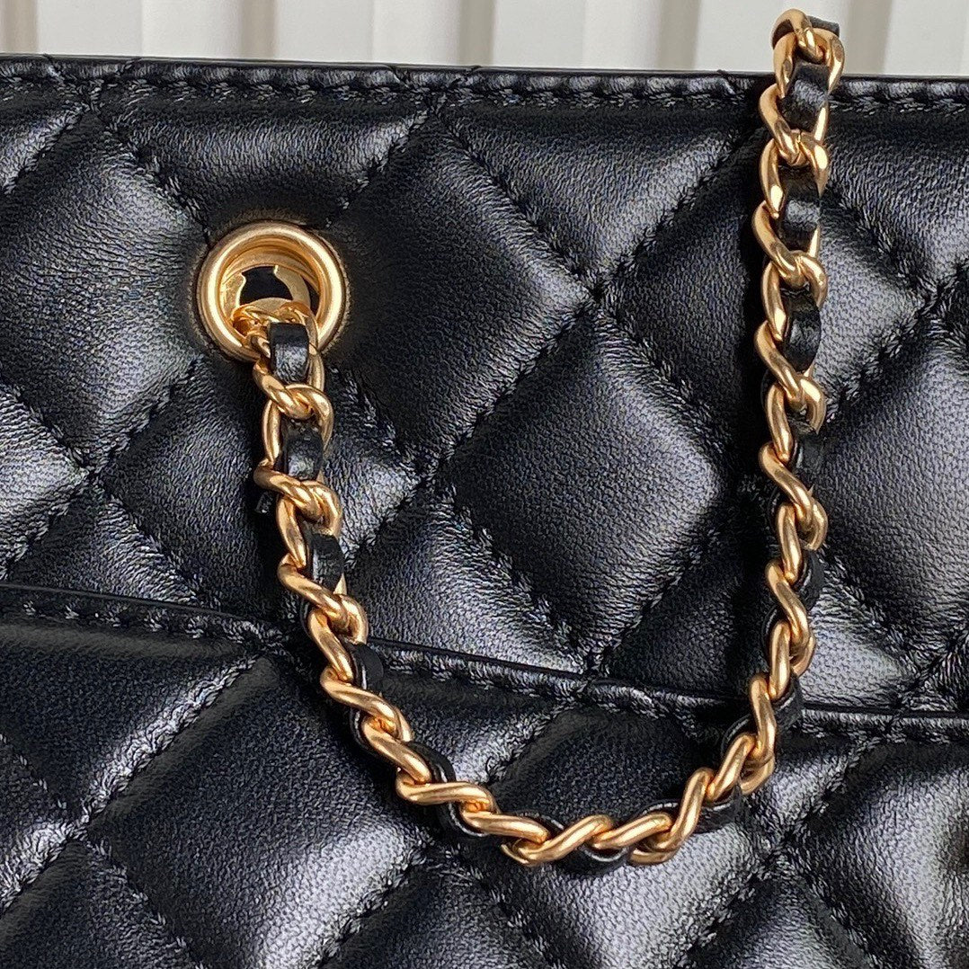 Sac cabas 24 carats 32 cm en cuir de veau noir, finitions dorées