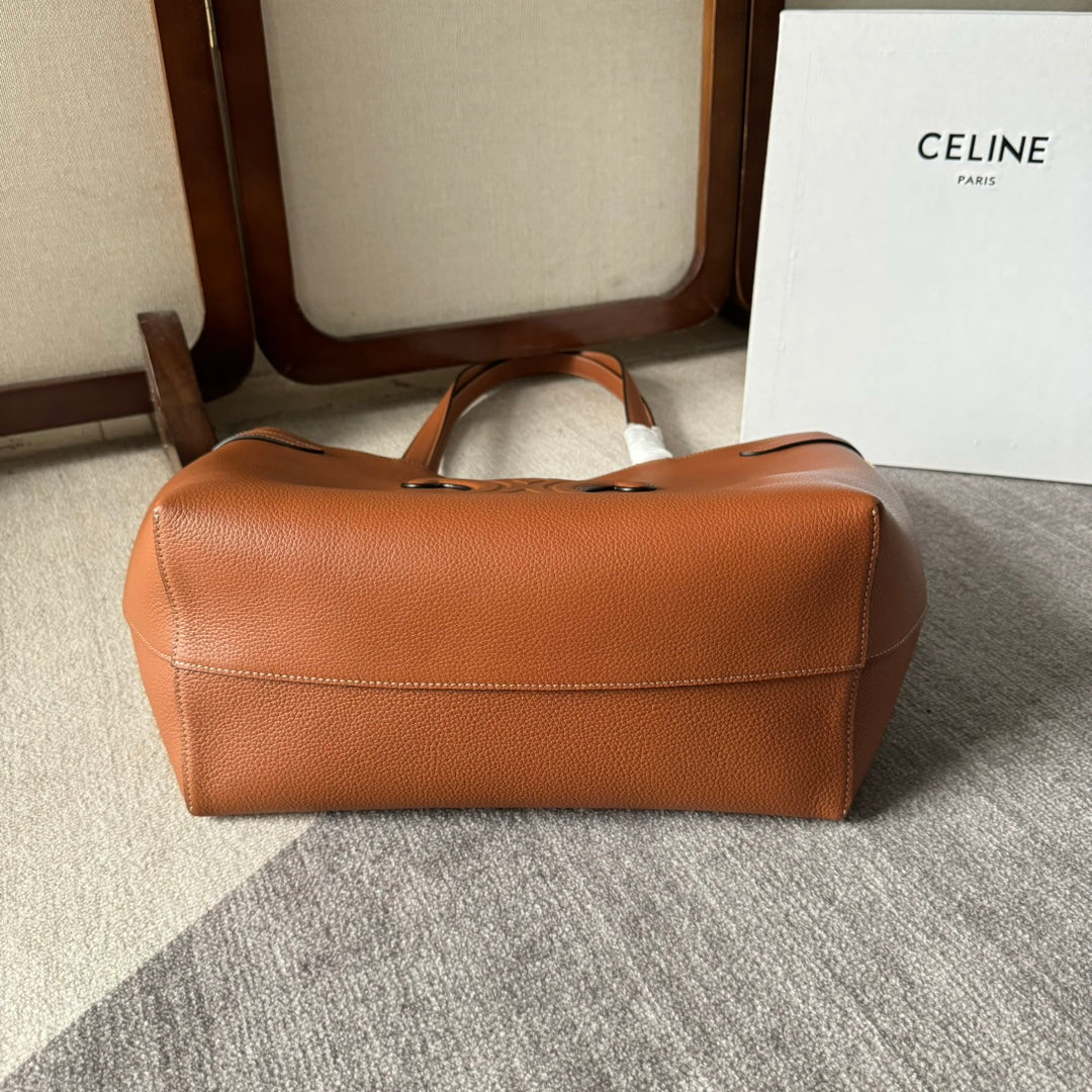 CABAS ANAÏS MOYEN CUIR TRIOMPHE 54 EN CUIR DE VEAU GRAINÉ BRONZE
