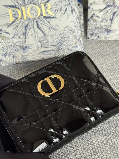 Portefeuille compact CD Logo Caro 11 cm en cuir de veau noir brillant