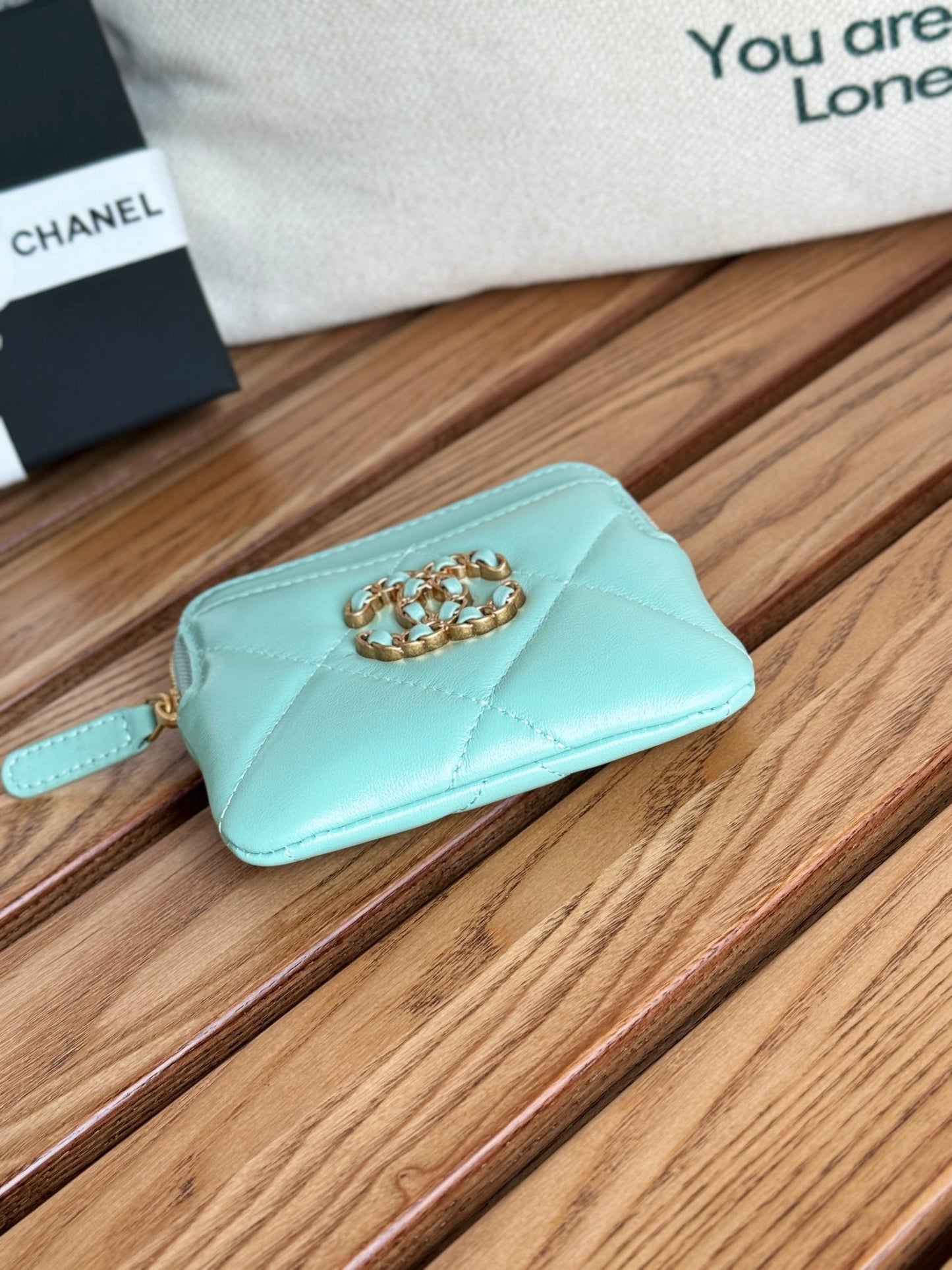 Porte-monnaie zippé CC 19 11 cm en cuir d'agneau bleu turquoise et accessoires dorés