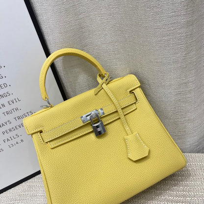 Sac à main HM Kelly 25 cm en cuir Togo citron vert et accessoires argentés