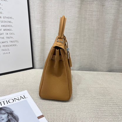 Sac à main HM Kelly 25 cm en cuir Togo marron avec accessoires argentés