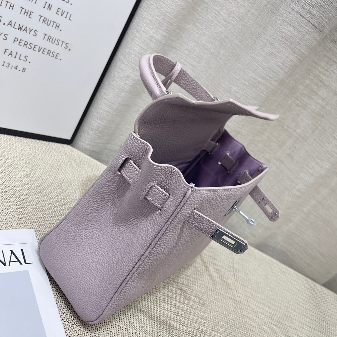 Sac à main HM Kelly 25 cm en cuir Togo mauve rose pâle et accessoires argentés