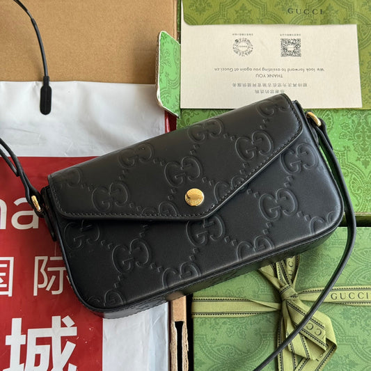 SUPER MINI SAC BANDOULIÈRE 21 EN CUIR DE VEAU GAUFRÉ NOIR