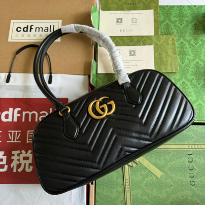 Sac à main GG Marmont Medium 35 cm en cuir de veau noir et accessoires dorés