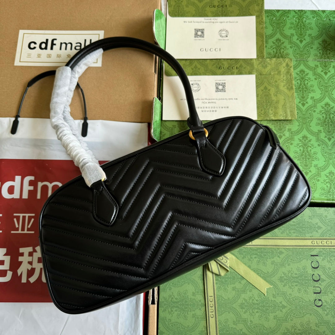 Sac à main GG Marmont Medium 35 cm en cuir de veau noir et accessoires dorés