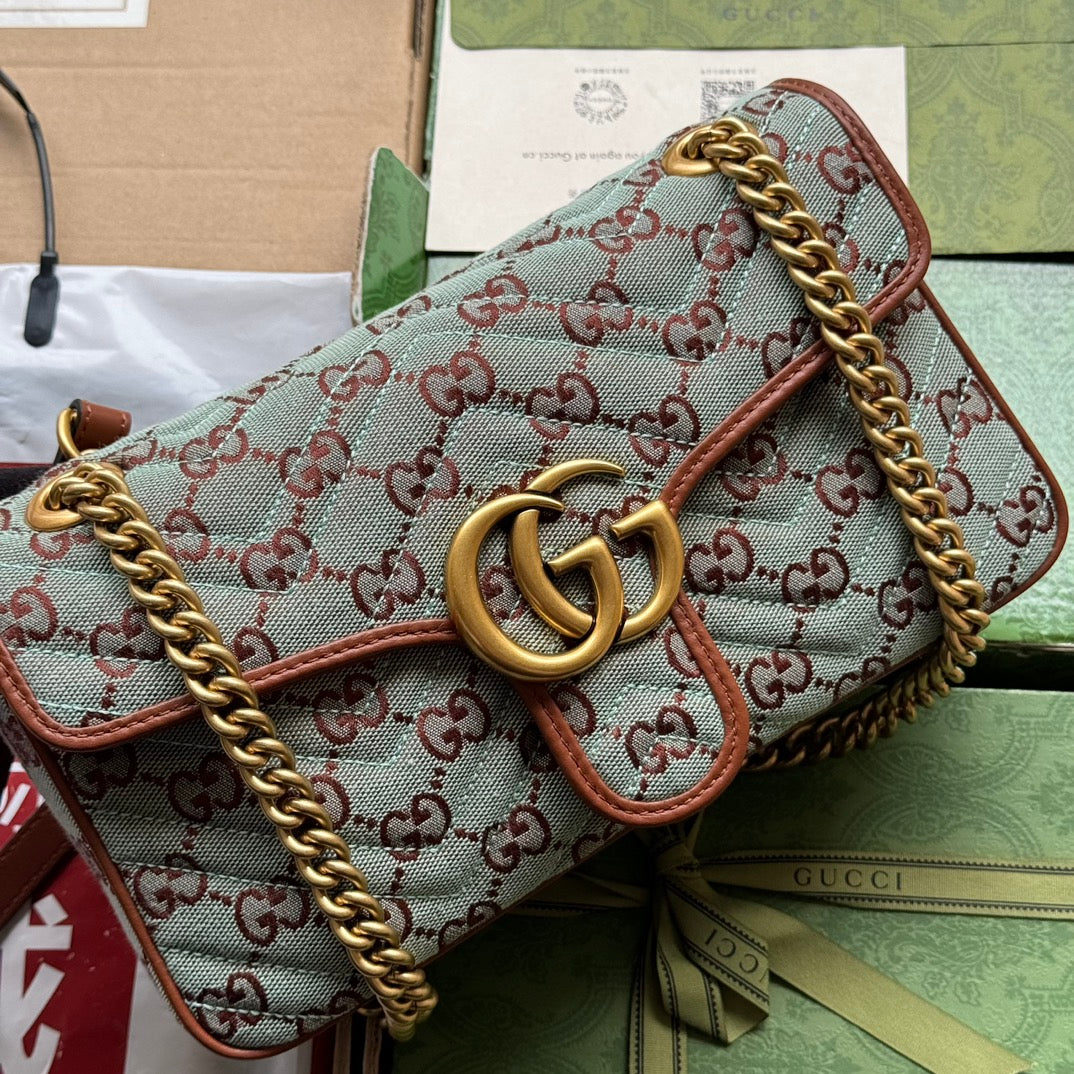 GG Marmont 26 cm en toile monogramme bleu chocolat avec finitions dorées