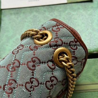 GG Marmont 26 cm en toile monogramme bleu chocolat avec finitions dorées