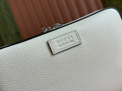 PETIT SAC BANDOULIÈRE 24 AVEC ÉTIQUETTE EN CUIR DE VEAU BLANC ET BORDURE EN TOILE